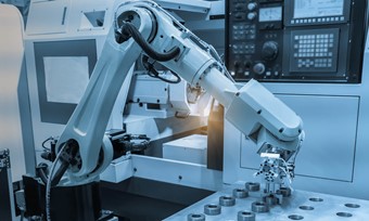 A robotic arm manufacturing products